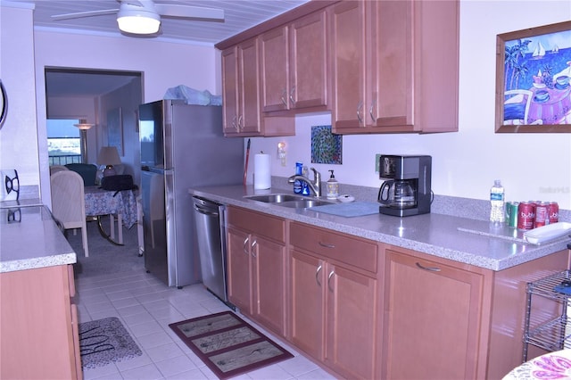 3200 Cove Cay Dr Unit 5F, Clearwater, FL 33760 - kitchen featuring dishwasher, light tile patterned floors, ceiling fan, light stone counters, and brown cabinets