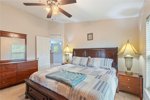 7804 Country Chase Ave, Lakeland, FL 33810 - bedroom featuring light colored carpet, ceiling fan, and vaulted ceiling