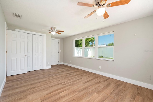 3509 Brookston Dr, Holiday, FL 34691 - unfurnished bedroom featuring light wood-type flooring, a closet, and ceiling fan