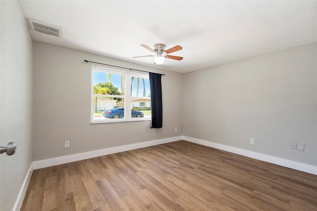3509 Brookston Dr, Holiday, FL 34691 - empty room featuring light wood finished floors and ceiling fan