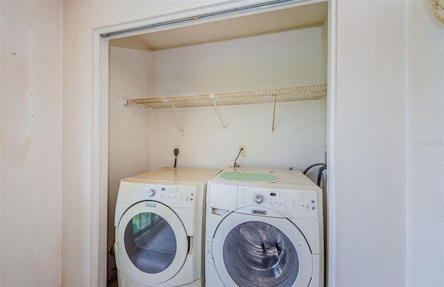 5265 E Bay Dr Unit 521, Clearwater, FL 33764 - laundry area featuring washing machine and clothes dryer