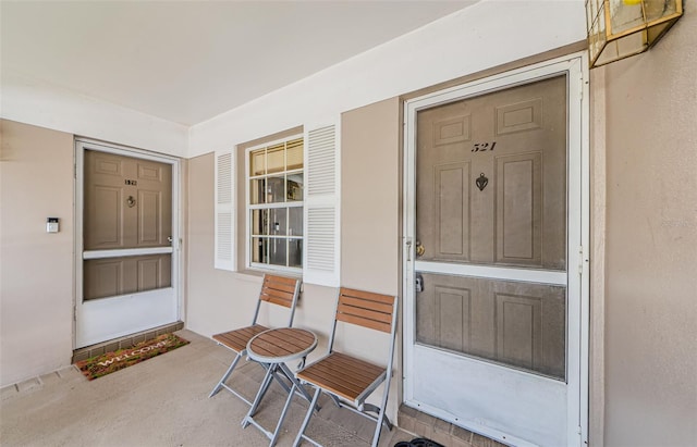 5265 E Bay Dr Unit 521, Clearwater, FL 33764 - entrance to property featuring stucco siding and covered porch
