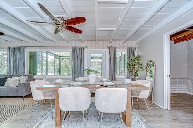 2201 Horan Way S, Gulfport, FL 33707 - dining space with beam ceiling, light wood-style flooring, and ceiling fan