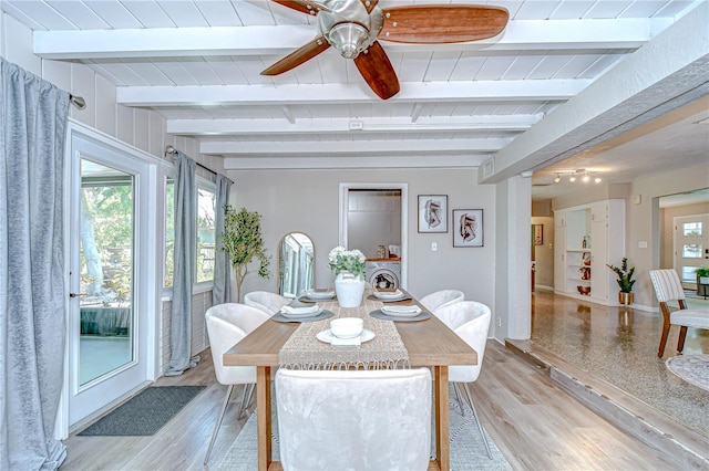 2201 Horan Way S, Gulfport, FL 33707 - dining area with beamed ceiling, a ceiling fan, and light wood-style floors