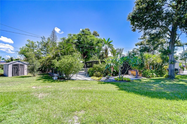 2201 Horan Way S, Gulfport, FL 33707 - view of grassy yard featuring a shed
