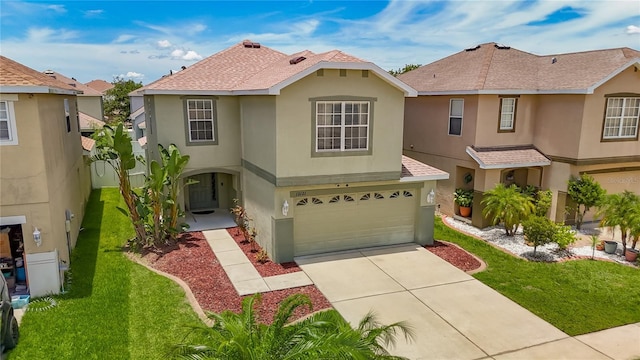 12121 Tree Haven Ave, Gibsonton, FL 33534 - view of front of house with stucco siding, an attached garage, and a front lawn