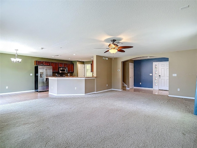 12121 Tree Haven Ave, Gibsonton, FL 33534 - unfurnished living room with ceiling fan, light carpet, a chandelier, stairs, and recessed lighting