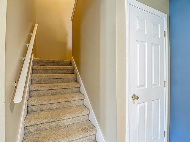 12121 Tree Haven Ave, Gibsonton, FL 33534 - stairway featuring baseboards