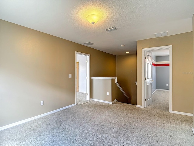 12121 Tree Haven Ave, Gibsonton, FL 33534 - empty room featuring carpet flooring and a textured ceiling