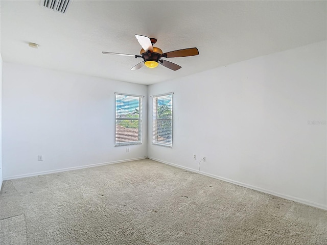 12121 Tree Haven Ave, Gibsonton, FL 33534 - spare room with a ceiling fan and light colored carpet