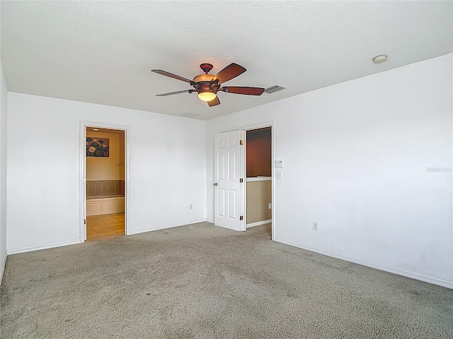 12121 Tree Haven Ave, Gibsonton, FL 33534 - carpeted empty room with a ceiling fan and a smoke detector