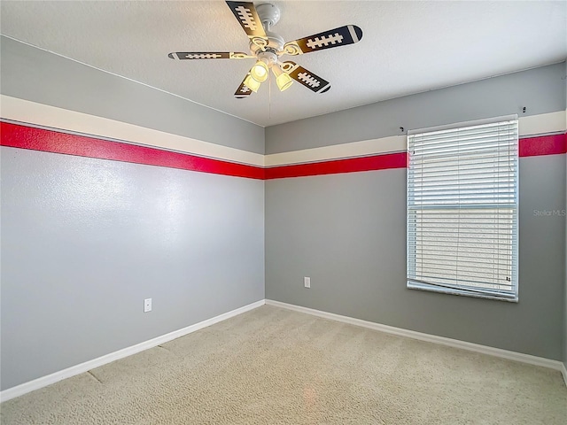 12121 Tree Haven Ave, Gibsonton, FL 33534 - carpeted empty room featuring ceiling fan and baseboards