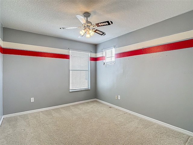 12121 Tree Haven Ave, Gibsonton, FL 33534 - empty room with a ceiling fan, a textured ceiling, and carpet