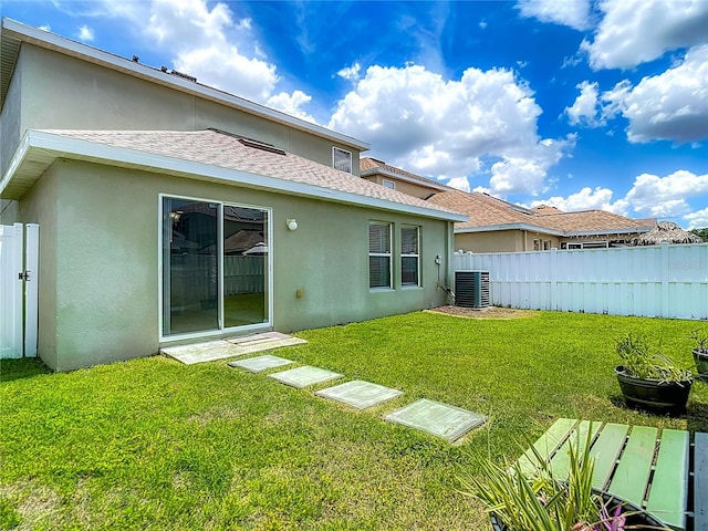 12121 Tree Haven Ave, Gibsonton, FL 33534 - back of property with stucco siding and roof with shingles