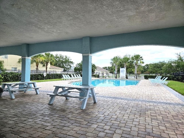 12121 Tree Haven Ave, Gibsonton, FL 33534 - community pool with a patio