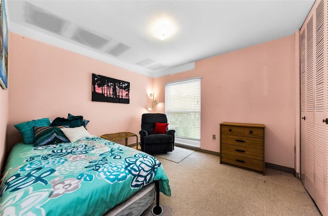 2700 Bayshore Blvd Unit 1206, Dunedin, FL 34698 - bedroom featuring a closet and carpet flooring