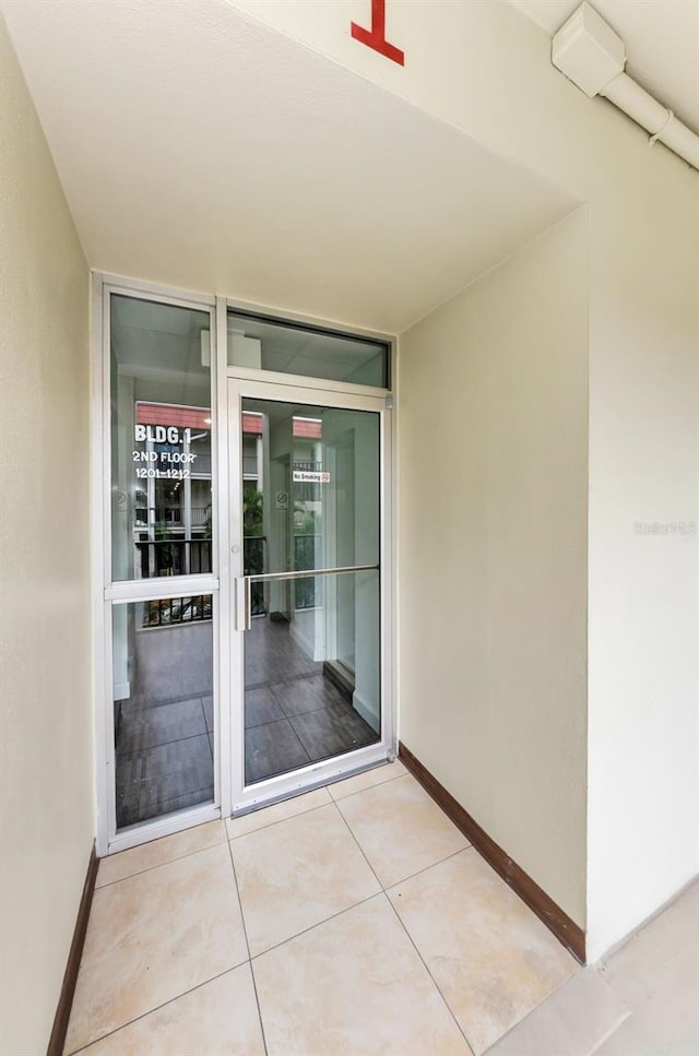 2700 Bayshore Blvd Unit 1206, Dunedin, FL 34698 - property entrance featuring stucco siding