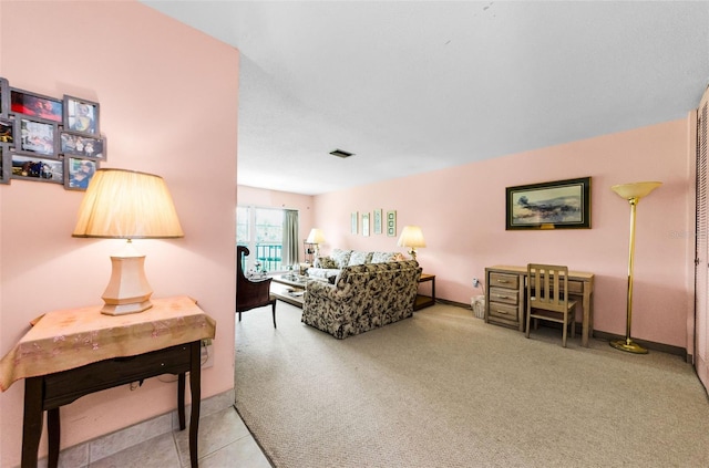 2700 Bayshore Blvd Unit 1206, Dunedin, FL 34698 - living room with carpet and baseboards