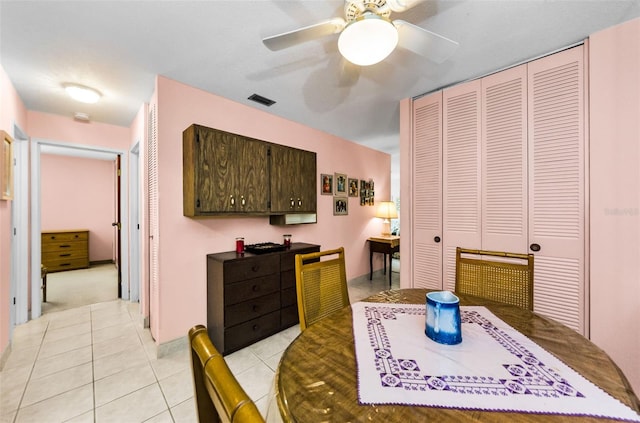 2700 Bayshore Blvd Unit 1206, Dunedin, FL 34698 - dining room featuring light tile patterned floors and a ceiling fan