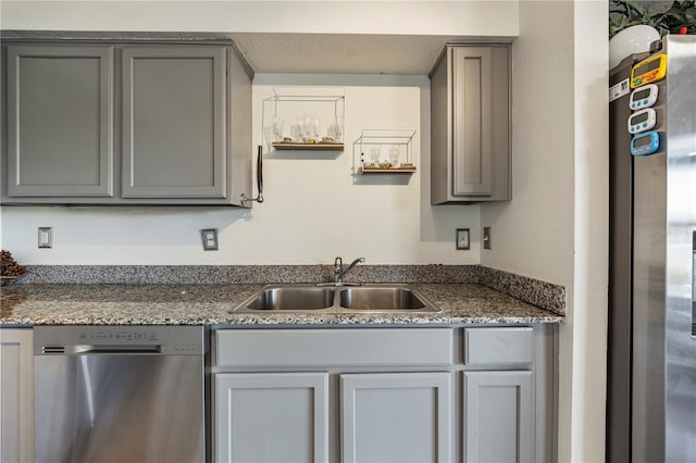 7819 Carriage Pointe Dr, Gibsonton, FL 33534 - kitchen with stainless steel appliances and gray cabinetry