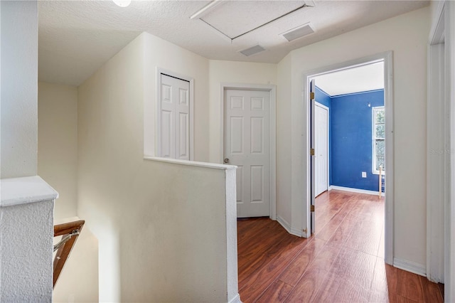 7819 Carriage Pointe Dr, Gibsonton, FL 33534 - hallway with wood finished floors and attic access