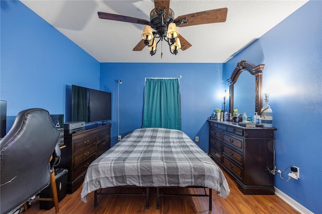 7819 Carriage Pointe Dr, Gibsonton, FL 33534 - bedroom with wood finished floors and ceiling fan