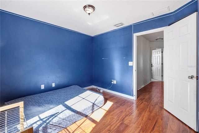7819 Carriage Pointe Dr, Gibsonton, FL 33534 - empty room with wood finished floors and baseboards