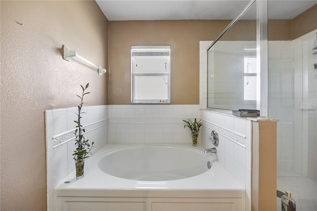 7819 Carriage Pointe Dr, Gibsonton, FL 33534 - bathroom featuring a garden tub and tiled shower