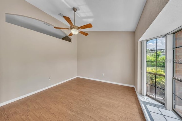 302 Old Mulrennan Rd, Valrico, FL 33594 - spare room featuring vaulted ceiling, ceiling fan, and light wood finished floors