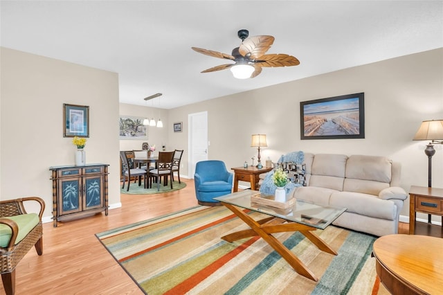 2814 Highlands Blvd Unit B, Palm Harbor, FL 34684 - living area with wood finished floors and a ceiling fan
