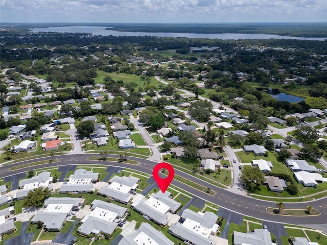 2814 Highlands Blvd Unit B, Palm Harbor, FL 34684 - aerial overview of property's location featuring a large body of water and nearby suburban area