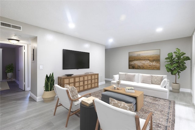 3805 Cortez Cir Unit B, Tampa, FL 33614 - living area featuring light wood-type flooring and recessed lighting