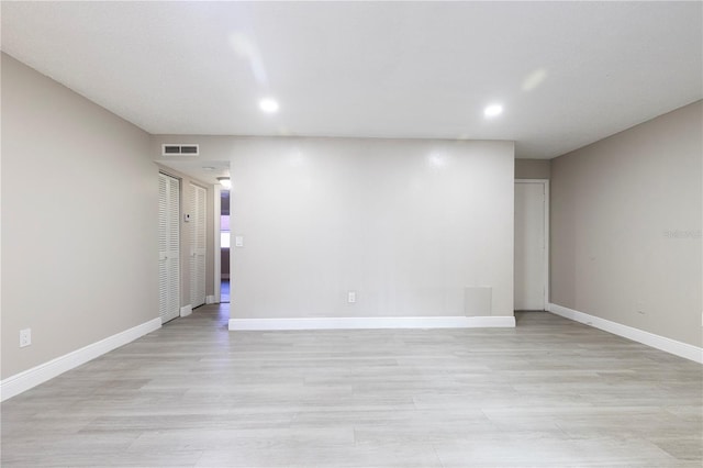 3805 Cortez Cir Unit B, Tampa, FL 33614 - unfurnished room with light wood finished floors and recessed lighting