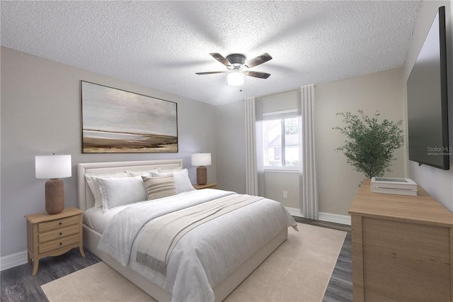 3805 Cortez Cir Unit B, Tampa, FL 33614 - bedroom featuring wood finished floors, a textured ceiling, and a ceiling fan