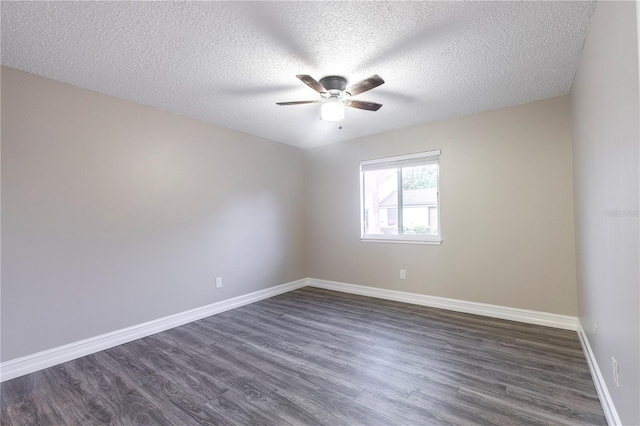 3805 Cortez Cir Unit B, Tampa, FL 33614 - empty room featuring dark wood-type flooring, ceiling fan, and a textured ceiling