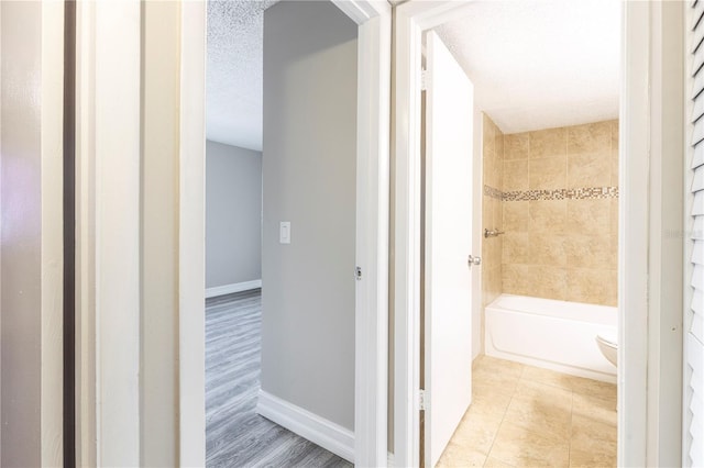 3805 Cortez Cir Unit B, Tampa, FL 33614 - hall featuring baseboards and tile patterned flooring