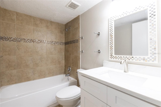 3805 Cortez Cir Unit B, Tampa, FL 33614 - bathroom with vanity, a textured ceiling, bathing tub / shower combination, and a textured wall