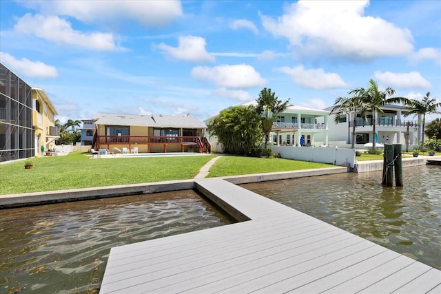 17025 Dolphin Dr, North Redington Beach, FL 33708 - dock area featuring a water view, a lawn, and a residential view
