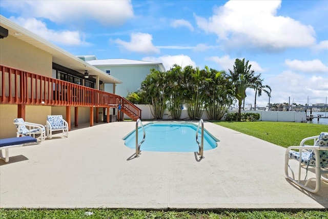 17025 Dolphin Dr, North Redington Beach, FL 33708 - view of pool featuring a patio, a ceiling fan, stairway, and a deck