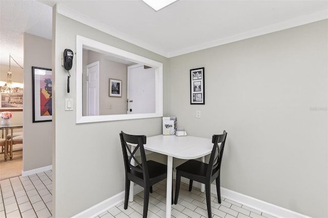 1 Key Capri Unit 302E, Treasure Island, FL 33706 - dining space featuring light tile patterned floors and a chandelier