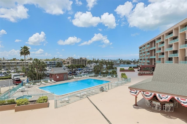 1 Key Capri Unit 302E, Treasure Island, FL 33706 - community pool with a patio area