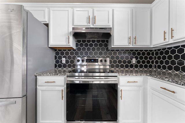 1291 Blackrush Dr, Tarpon Springs, FL 34689 - kitchen featuring stainless steel appliances, range hood, white cabinetry, and backsplash