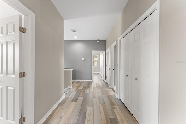 1291 Blackrush Dr, Tarpon Springs, FL 34689 - corridor featuring light wood-type flooring and recessed lighting