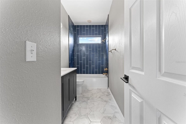 1291 Blackrush Dr, Tarpon Springs, FL 34689 - full bath with marble look tile flooring, vanity, tub / shower combination, and a textured wall