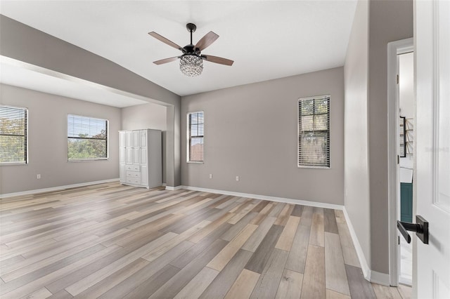 1291 Blackrush Dr, Tarpon Springs, FL 34689 - spare room with light wood-style flooring and ceiling fan
