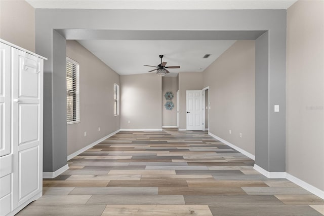 1291 Blackrush Dr, Tarpon Springs, FL 34689 - empty room with ceiling fan and light wood-style floors
