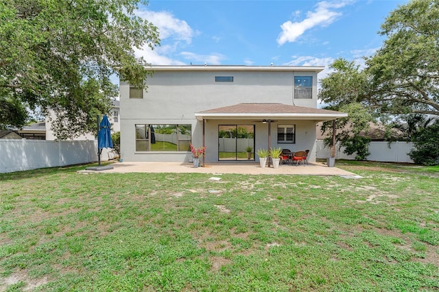 1291 Blackrush Dr, Tarpon Springs, FL 34689 - rear view of property featuring a ceiling fan, stucco siding, a patio, and a fenced backyard