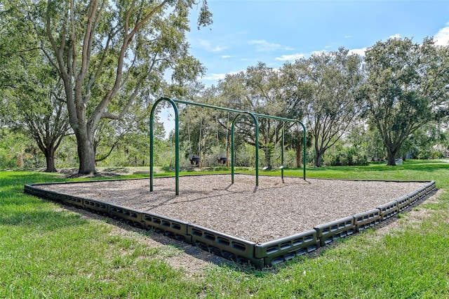 1291 Blackrush Dr, Tarpon Springs, FL 34689 - community jungle gym featuring a yard