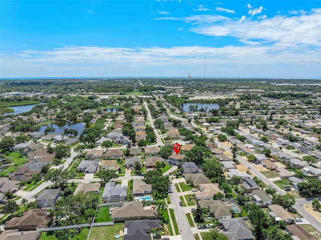 1291 Blackrush Dr, Tarpon Springs, FL 34689 - aerial perspective of suburban area featuring a large body of water