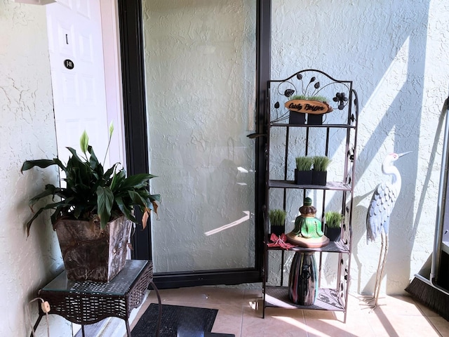 1865 Mazo Mnr Unit 1, Lutz, FL 33558 - view of exterior entry featuring stucco siding